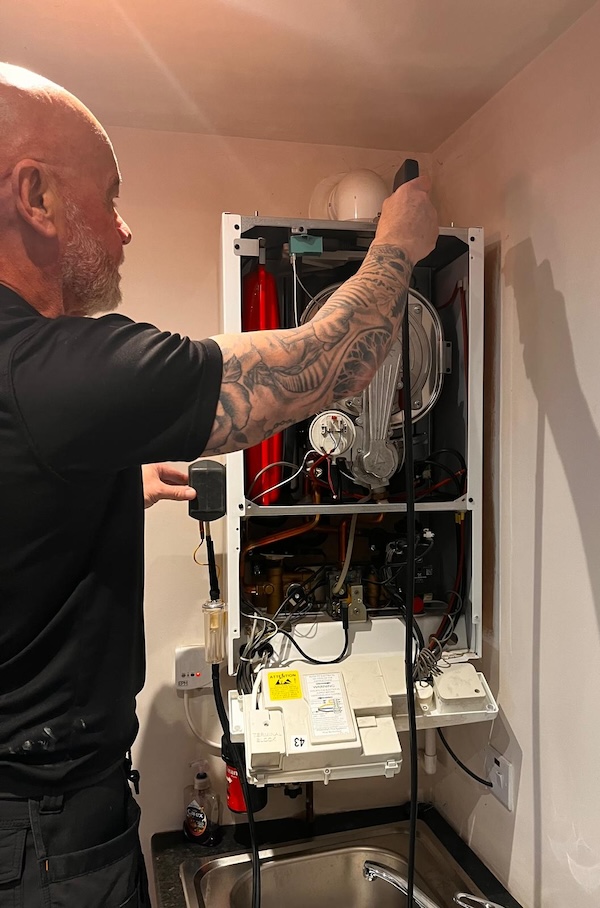 N&B engineer servicing a domestic boiler