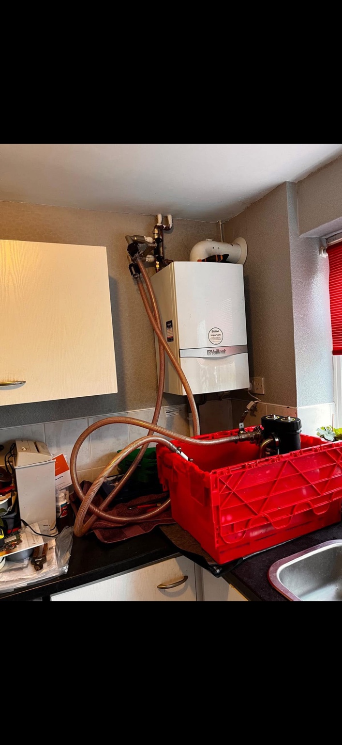 Heating system being power flushed