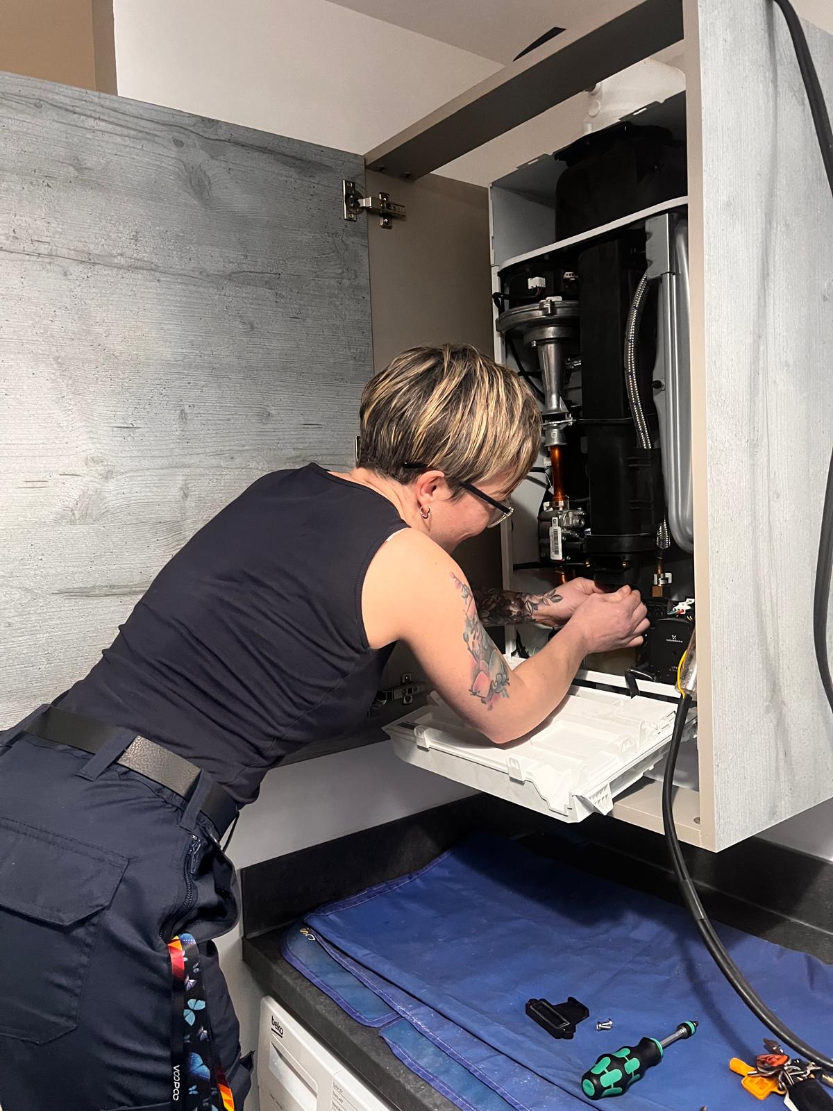 N&B engineer working on a boiler